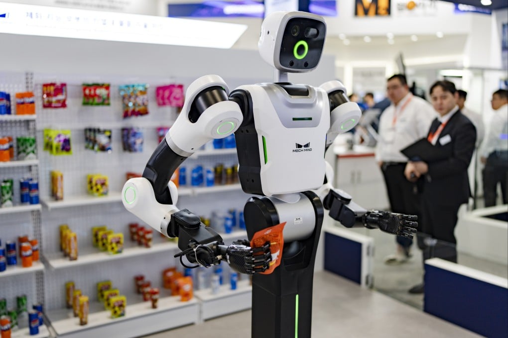 Visitors explore the Mech-Mind Robotics booth during Smart Factory & Automation World 2026 in Seoul, South Korea, on March 5. Photo: NurPhoto via Getty Images