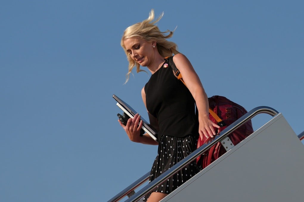 White House aide Natalie Harp disembarks Air Force One at Joint Base Andrews on August 9. Photo: AP