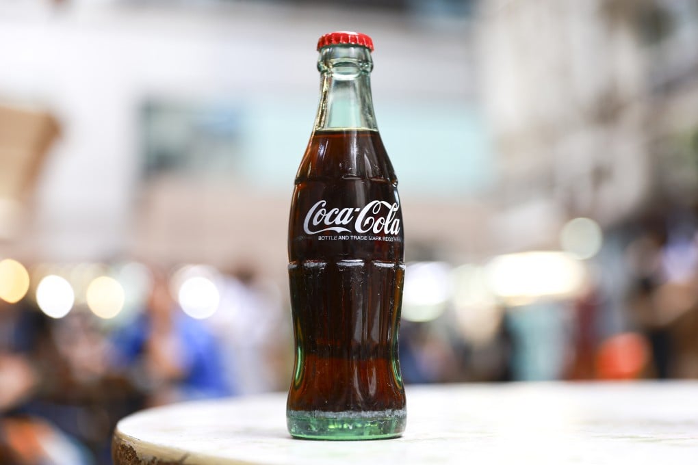 Drinking Coca-Cola out of a glass bottle tastes best to many Hongkongers, thanks in part to its nostalgic link with the city’s dai pai dongs (open-air food stalls). Photo: May Tse