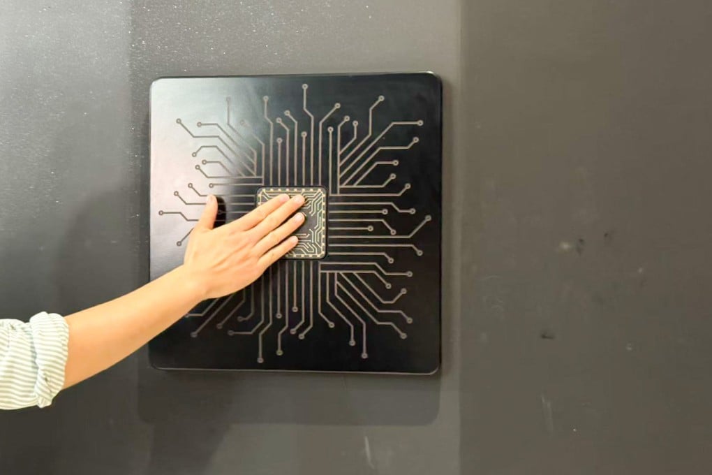 A button shaped like a silicon chip unlocks the exhibition hall at a Shanghai AI research institute. Photo: Wency Chen