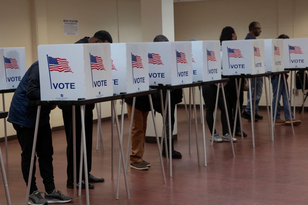 Voters cast their votes during voting in the US presidential election at a polling station in Detroit, Michigan, on November 3, 2024. Photo: Reuters