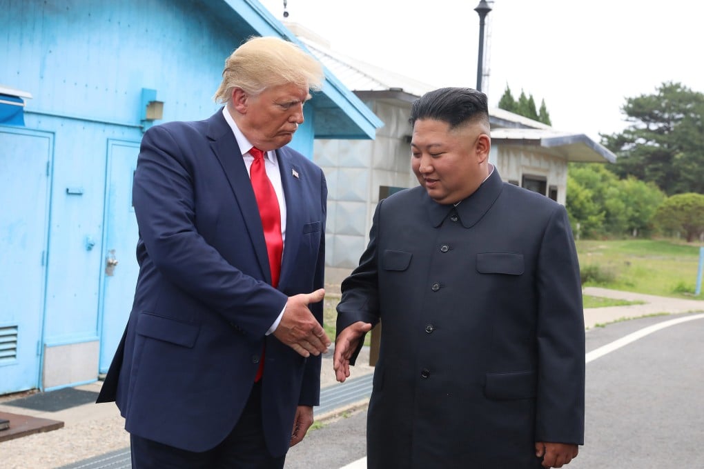 US President Donald Trump (left) and North Korean leader Kim Jong-un meet at the demilitarised zone in June 2019, the third of their three face-to-face meetings during Trump’s first term. Photo: Getty Images/TNS