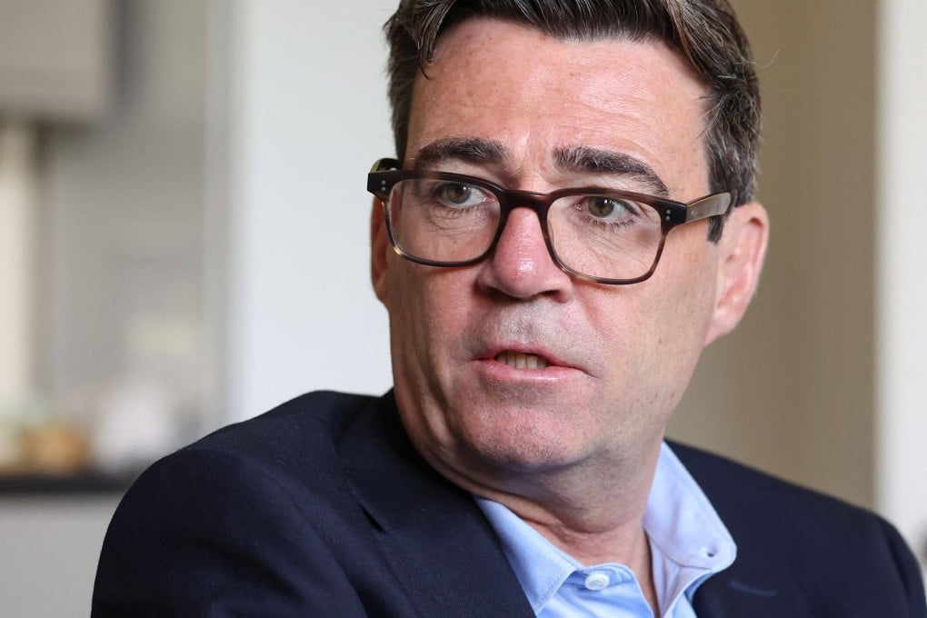 Britain’s Prime Minister Andy Burnham speaks with staff and residents as he pays a visit to the homelessness charity Changing Lives in Newcastle on Wednesday. Photo: AFP