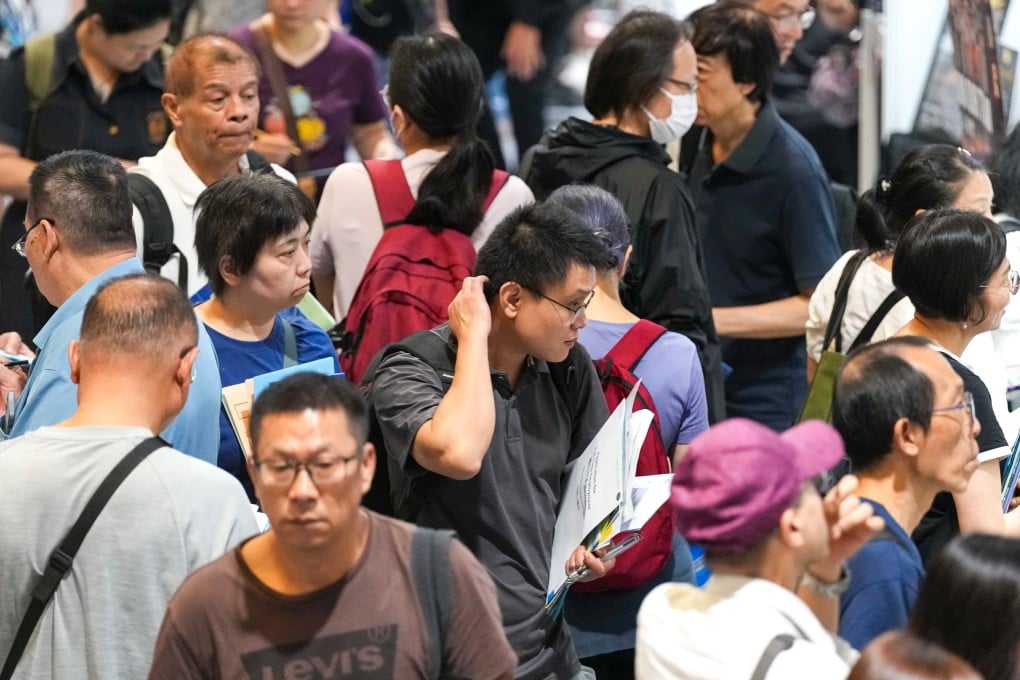 Residents check out a recent job fair in Mong Kok. Photo: Karma Lo