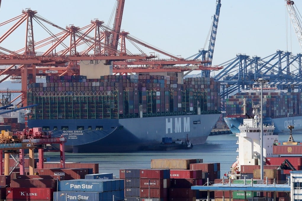 Container ships are loaded with cargo at Busan New Port in Busan, South Korea, in January 2022. Photo: EPA-EFE
