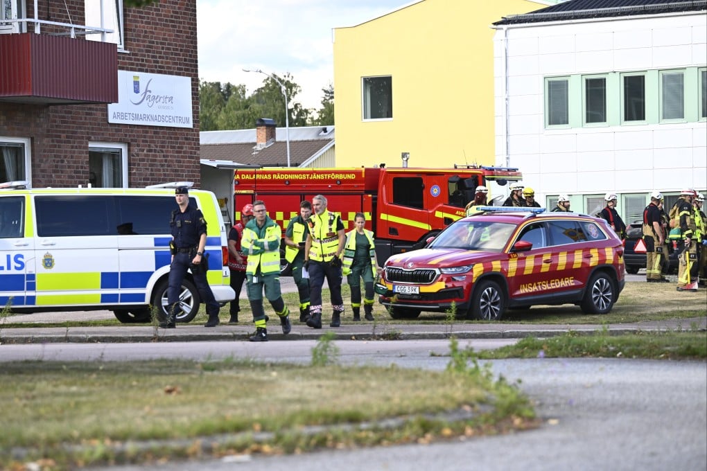 Police and rescue services on site at the Brinell school during an emergency response after a man with a sword reportedly injured several people at the school in Fagersta, Sweden on Friday. Photo: EPA