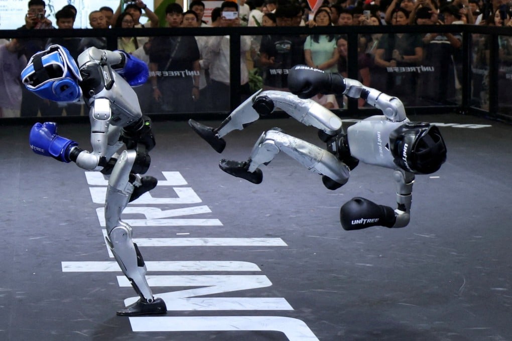 Unitree Robotics robots demonstrate kickboxing during the World Robot Conference in Beijing on Wednesday. Photo: Reuters