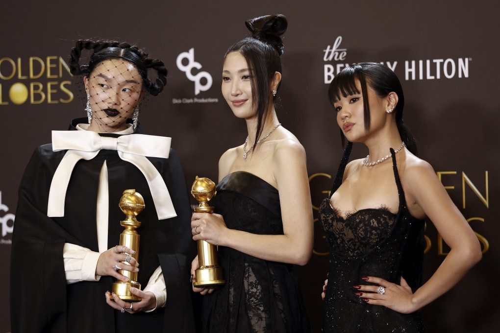 (From left) Audrey Nuna, Ejae and Rei Ami pose with their award for “Golden” from “KPop Demon Hunters” during the Golden Globe Awards ceremony in Beverly Hills in January. Photo: EPA