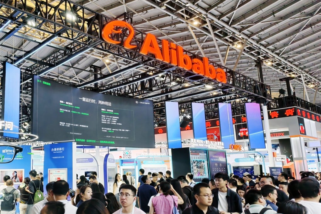 Tourists visit the Alibaba Group booth at the 2026 World Artificial Intelligence Conference in Shanghai, China, on July 17. Photo: CFOTO/Future Publishing via Getty Images