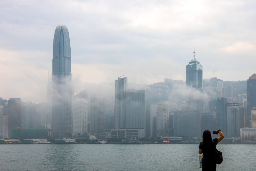 A thick, humid haze settles over Victoria Harbour in April. Hong Kong has set a plan to achieve carbon neutrality before 2050 alongside an overall energy reduction goal. Photo: Dickson Lee