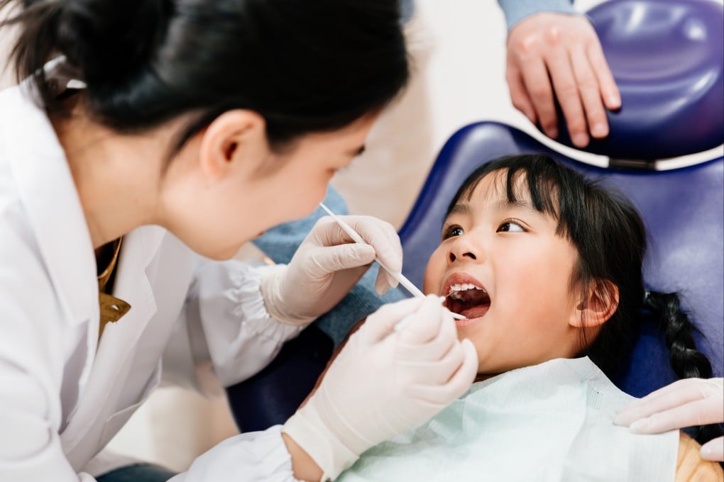 Conducting examinations in a familiar school environment will help ease young children’s anxieties, a dental consultant has said. Photo: Getty Images