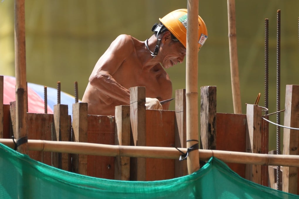 A construction worker on site under the extreme heat in To Kwa Wan on August 10. The city reached a scorching 36.9 degrees Celsius on August 9, the ­highest temperature recorded since the Hong Kong Observatory began operating in 1884. Photo: Sam Tsang