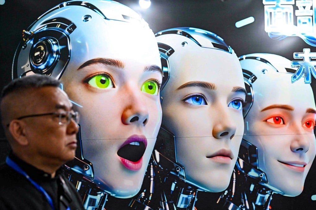 A man stands next to a poster showing robots mimicking human expressions from Shenzhen Xiaoquan Technology during the International AI Application and Robotics Innovation Exhibition in Beijing on March 18. Photo: AFP