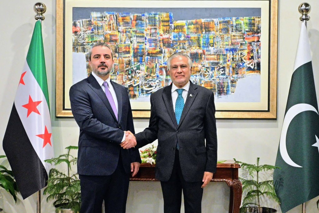 Syrian Foreign Minister Asaad al-Shaibani (left) shakes hands with his Pakistani counterpart Ishaq Dar in Islamabad on Thursday. Photo: Ministry of Foreign Affairs of Pakistan / AFP