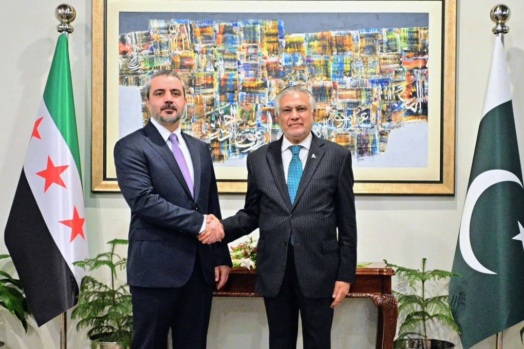 Syrian Foreign Minister Asaad al-Shaibani (left) shakes hands with his Pakistani counterpart Ishaq Dar in Islamabad on Thursday. Photo: Ministry of Foreign Affairs of Pakistan / AFP