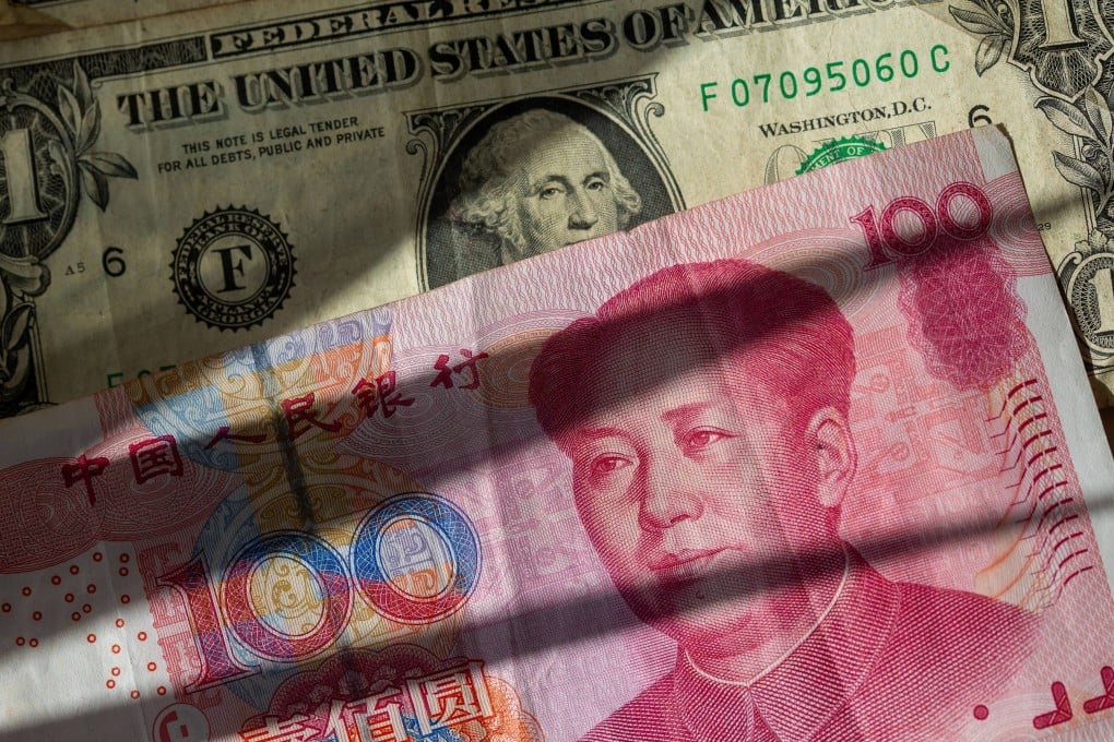 Chinese yuan and US dollar banknotes are seen in this arranged photo taken April 9, 2025. Photo: dpa