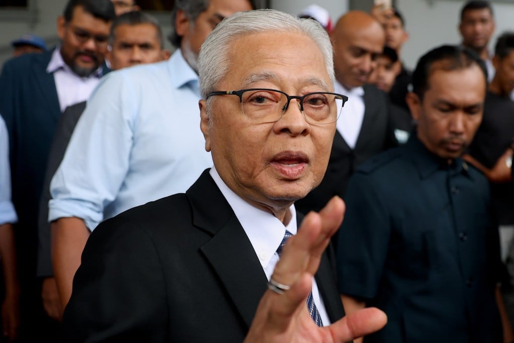 Former Malaysian prime minister, Ismail Sabri Yaakob, waves as he leaves a court in Kuala Lumpur on Thursday. Photo: EPA