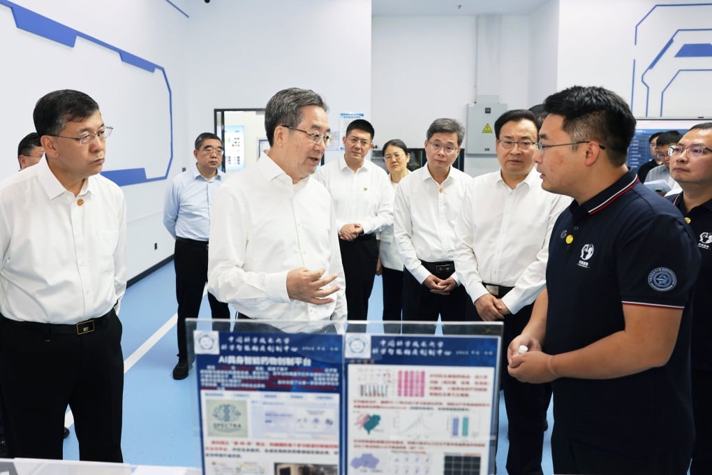 Vice-Premier Ding Xuexiang discusses the application of artificial intelligence in scientific research at the University of Science and Technology of China in Hefei, Anhui province, on Wednesday. Photo: Xinhua