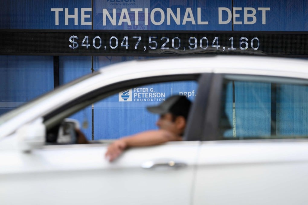 An electronic display shows the US national debt in Washington on August 19. The US national debt exceeded a record US$40 trillion. The uptick in borrowing comes as longer term US obligations linked to social security and health care have been growing, while interest payments have climbed as well. Photo: AFP