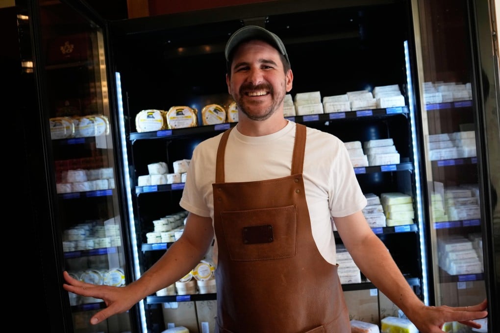 Erwan Leo, owner of Le Butter Shop, stands in front of a fridge at his shop that is devoted entirely to butter in Paris, France, on August 25, 2026. Photo: AP Photo/Christophe Ena