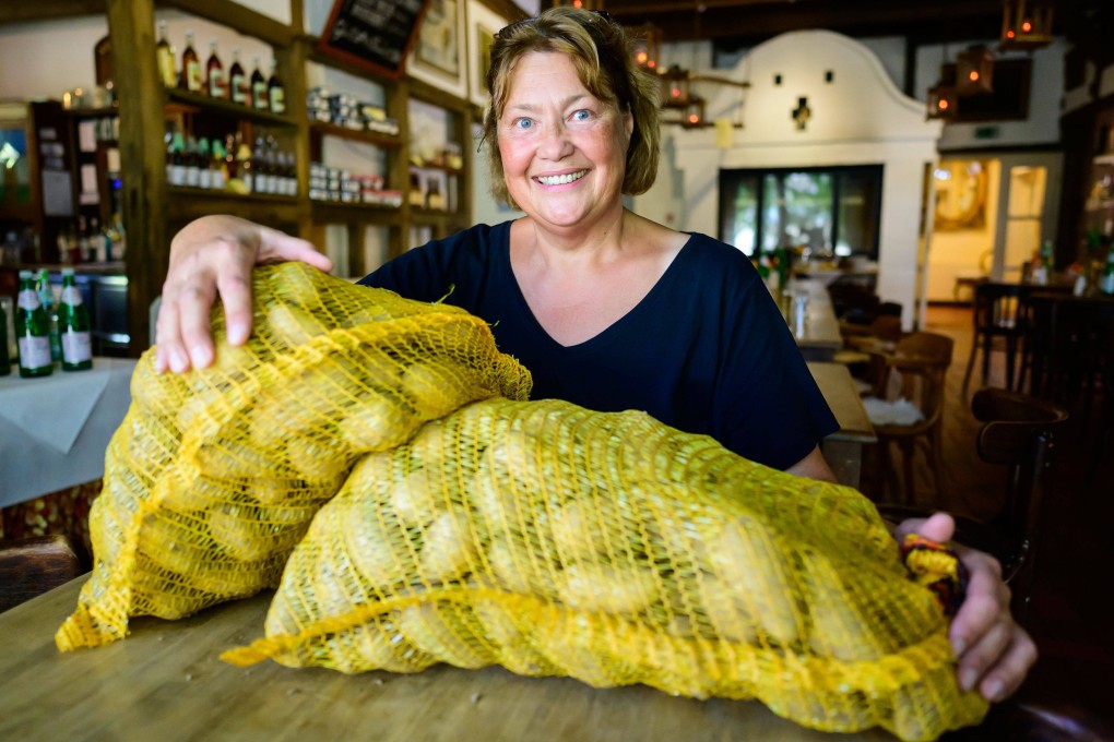 Sylvia Methfessel, the right-hand woman of Potato Hotel owner Olaf Stehr, says young people from all over the world visit the German hotel. Photo: Philipp Schulze/dpa