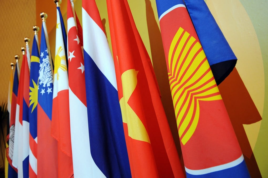 The Association of Southeast Asian Nations’ flag (right) seen alongside the flags of member states at a forum in Singapore in 2008. Photo: AFP