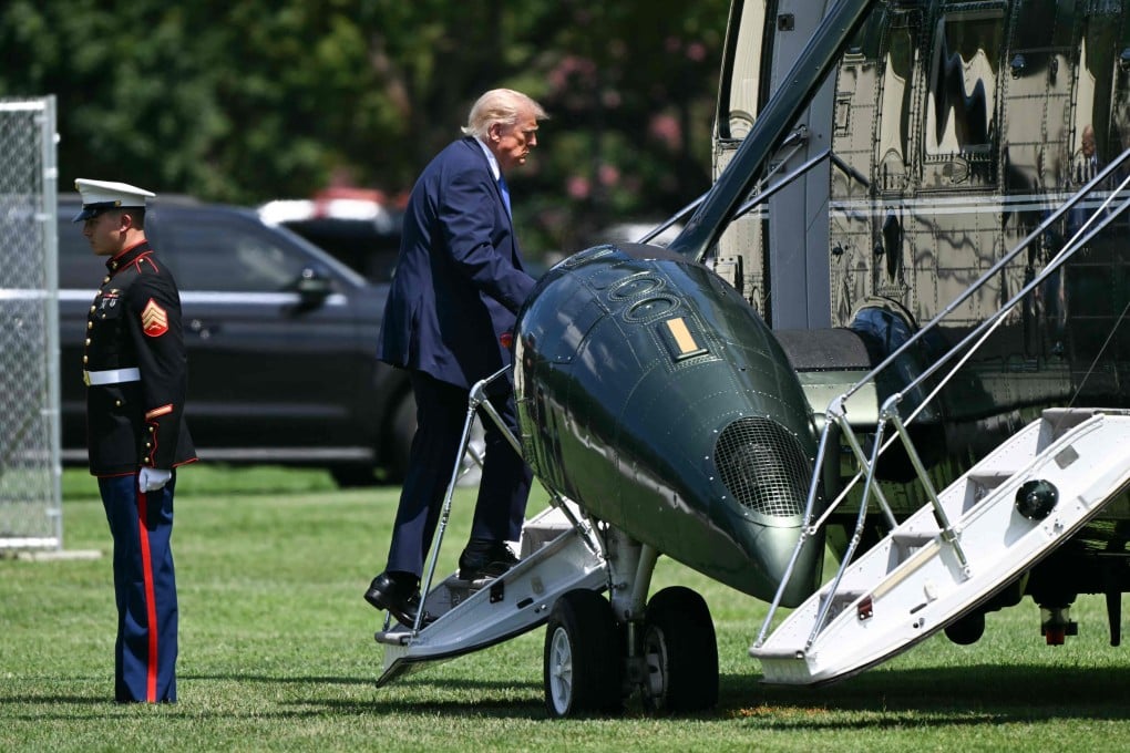 US President Donald Trump boarding Marine One on the Ellipse near the White House on August 4. Photo: AFP