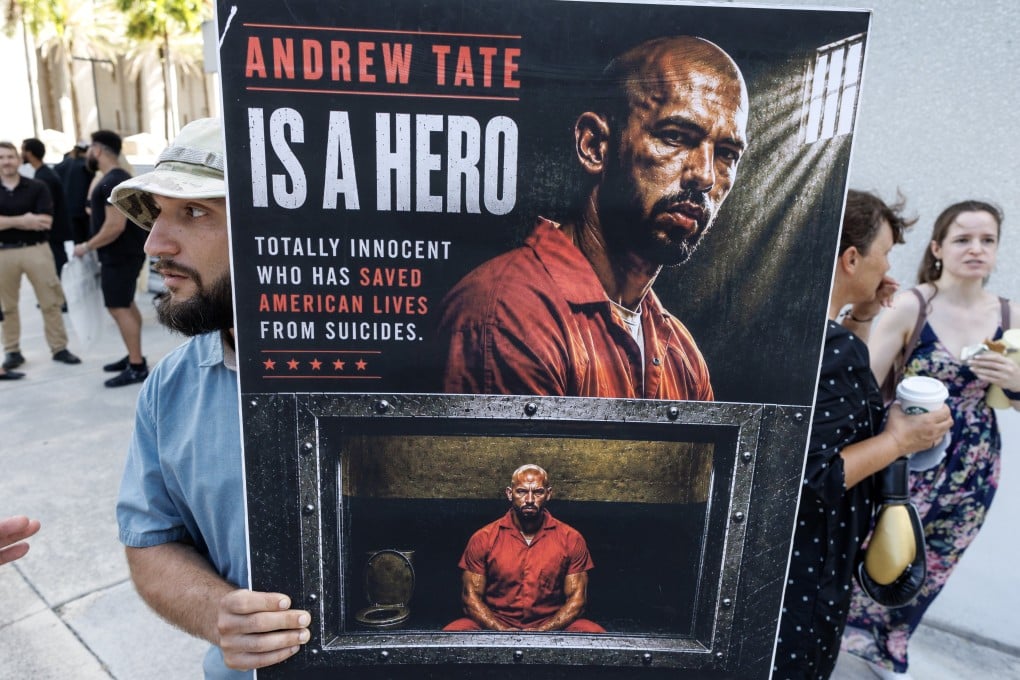 Supporters of social media influencers Andrew and Tristan Tate gather outside the courthouse in Miami, Florida, on Thursday. Photo: EPA