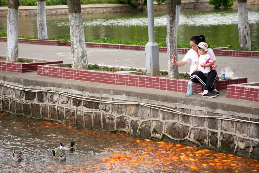 A woman and child at Zhongshan Park in Guangdong province. Photo: Shutterstock Images