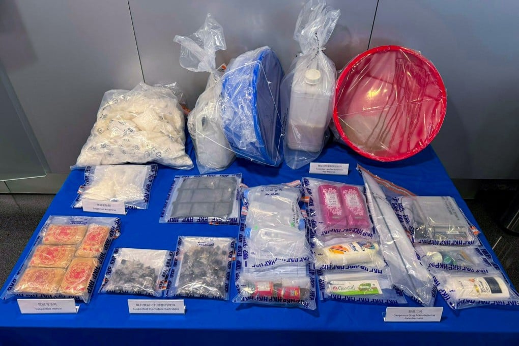 The suspected illegal drugs seized included 76kg of cocaine, 65kg of ketamine, 3.7 litres of liquid etomidate, and 6,400 etomidate vape pods. Photo: Hong Kong Police