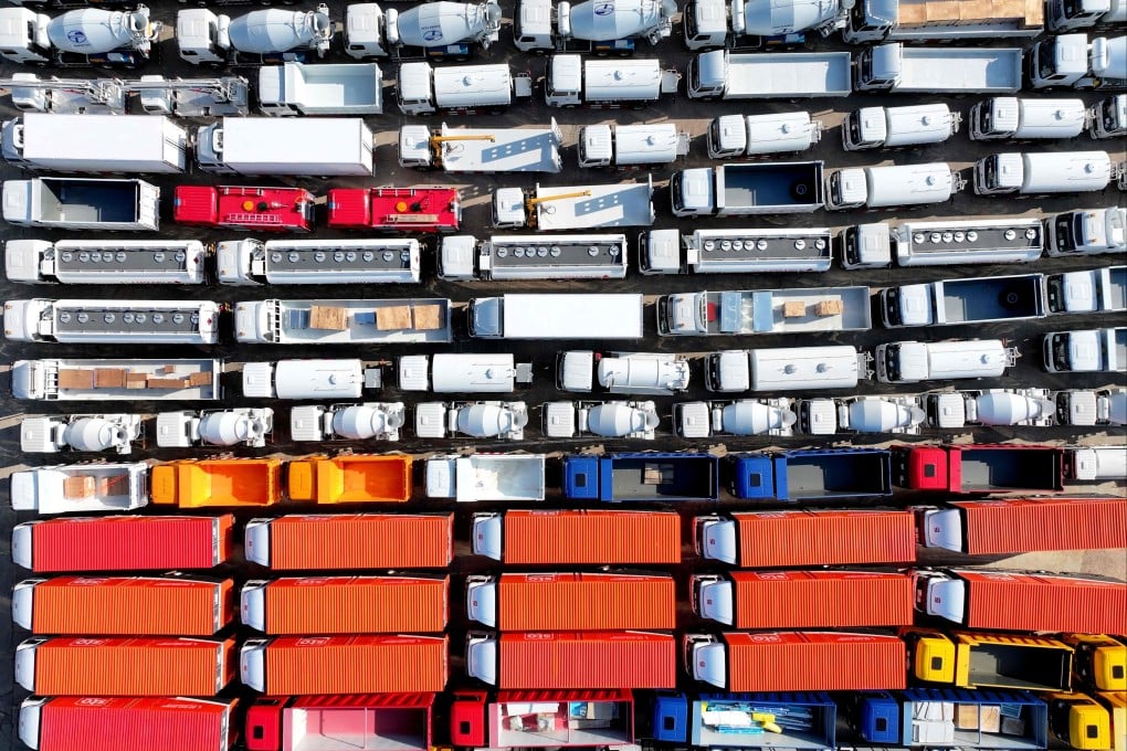 Trucks for export are seen at a port in Lianyungang in eastern China’s Jiangsu province on August 6. Photo: AFP