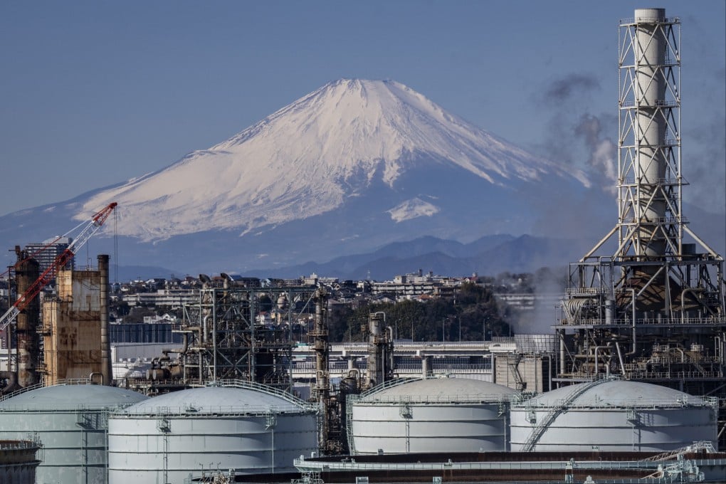 An industrial zone in Yokohama, Japan’s Kanagawa prefecture, is seen with Mount Fuji in the background. Photo: AFP