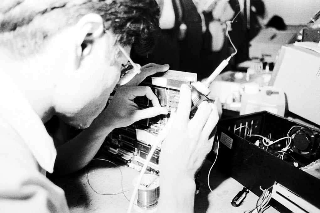 A technician works on a circuit board for electronics manufacturer International Quartz, which in the late 1980s was producing a range of computer and telephone products. Photo: SCMP Archives