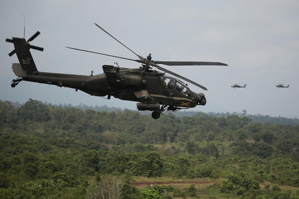 A US Army AH-64 Apache helicopter flies past during the Garuda Shield joint multinational exercise in Lampung, Indonesia, on  September 3, 2025. Photo: AFP