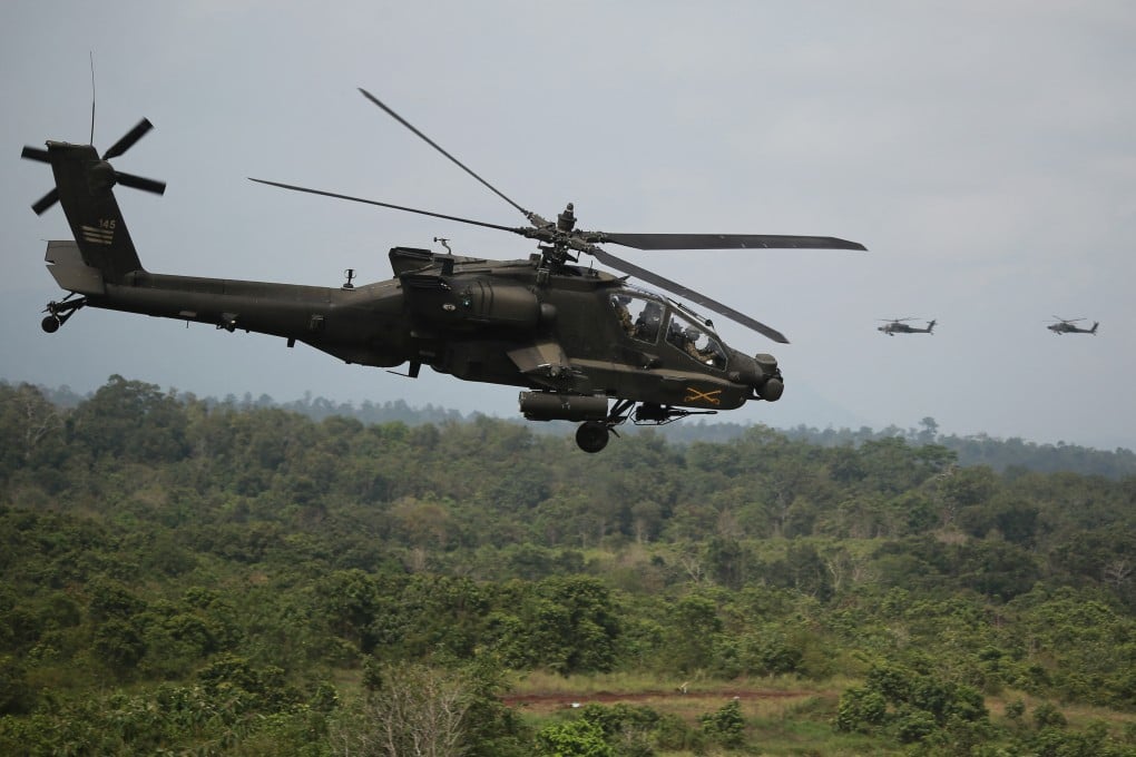 A US Army AH-64 Apache helicopter flies past during the Garuda Shield joint multinational exercise in Lampung, Indonesia, on September 3, 2025. Photo: AFP