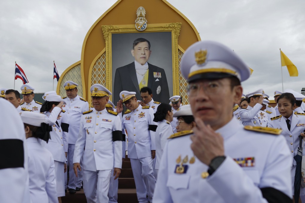 Thai officials leave after taking the oath of allegiance to become lawful civil servants to mark Thai King Maha Vajiralongkorn’s 74th birthday at Sanam Luang outside the Grand Palace in Bangkok on July 28. Photo: EPA