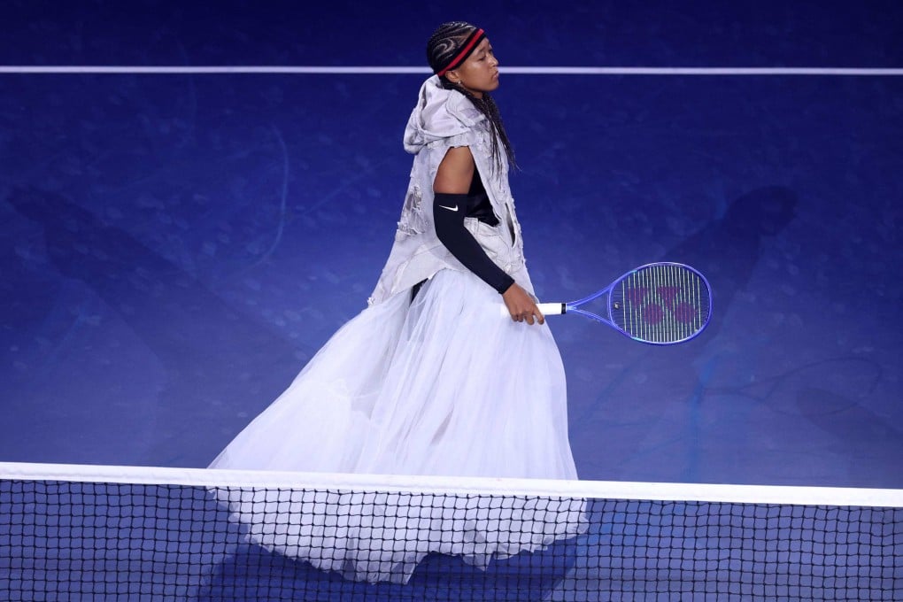 Naomi Osaka walks onto the court to face Anastasia Zakharova in their first-round match on day two of the US Open at USTA Billie Jean King National Tennis Center on Monday. Photo: AFP