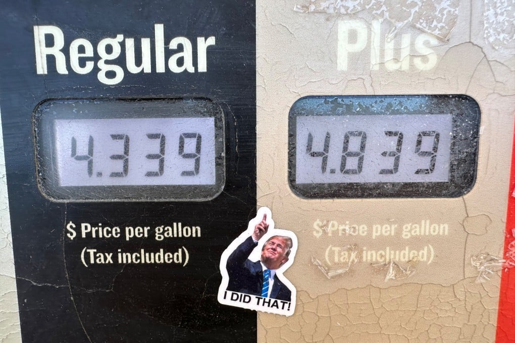 A sticker depicting US President Donald Trump pointing to high prices at a fuel pump. Photo: AFP