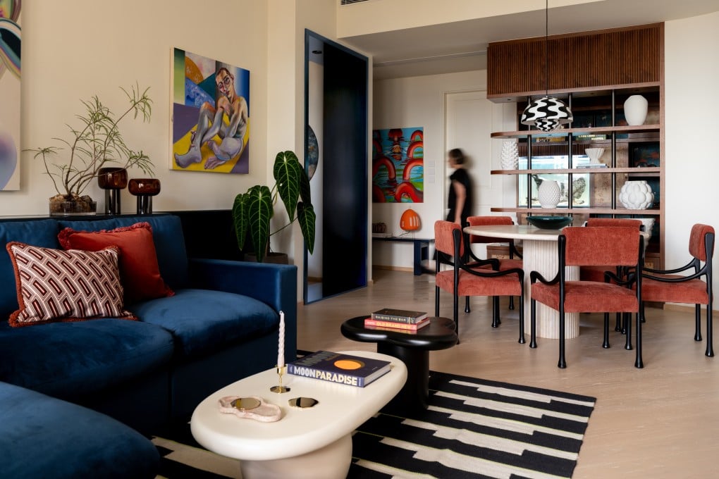 After a feng shui master declared the Ho Man Tin flat's front door sat in the wrong place, interior designer Quinn Wong created a partition wall facing the front door to carve out a small transitional hallway. Photo: Common Studio. Styling: Esther Van Wijck