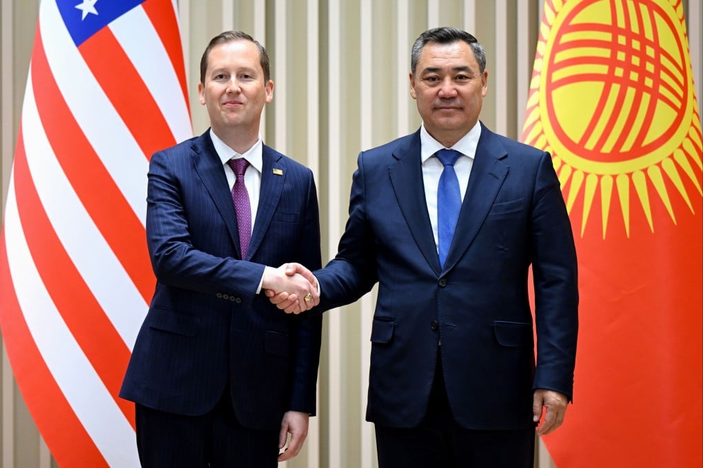 Sergio Gor, the US special envoy for South and Central Asia (left), and Kyrgyz President Sadyr Zhaparov shake hands for their meeting in Bishkek, Kyrgyzstan, on Monday. Photo: Kyrgyzstan Presidential Press Office via AP