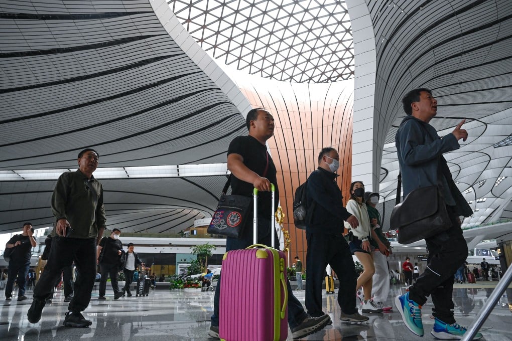 Chinese airlines transported 153.64 million passenger trips between July 1 and Monday, a historic high. Photo: AFP