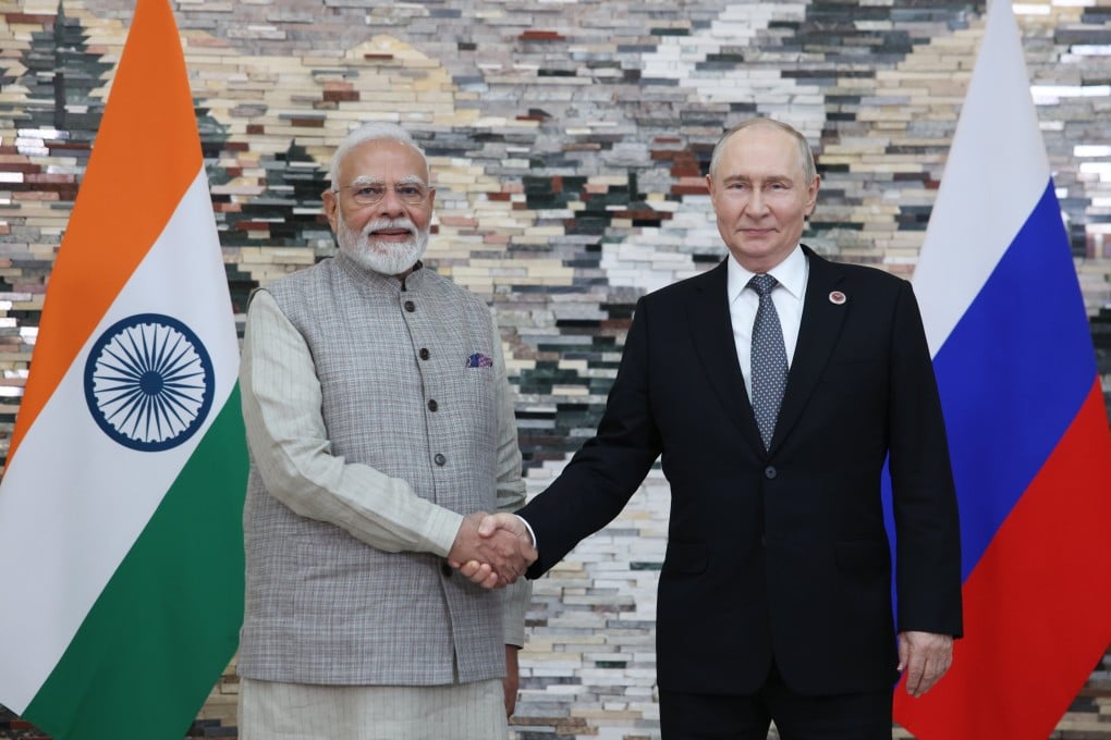 Indian Prime Minister Narendra Modi (left) and Russian President Vladimir Putin shake hands at the Shanghai Cooperation Organisation summit in Bishkek, Kyrgyzstan, on Monday. Photo: EPA