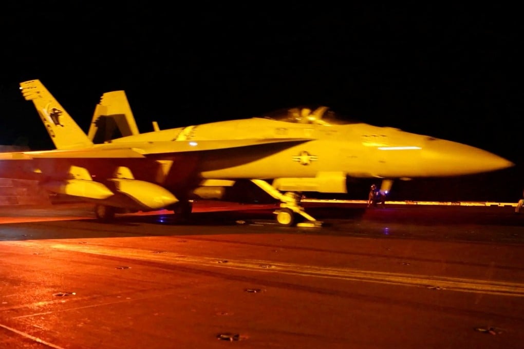 A warplane prepares for flight operations aboard a US aircraft carrier on the day US Central Command carried out air strikes against Iranian military targets. Photo: CENTCOM via Reuters
