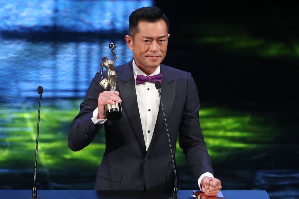 Hong Kong actor Louis Koo accepts the Best Actor trophy for his performance in Paradox at the 2018 Hong Kong Film Awards. Photo: K.Y. Cheng