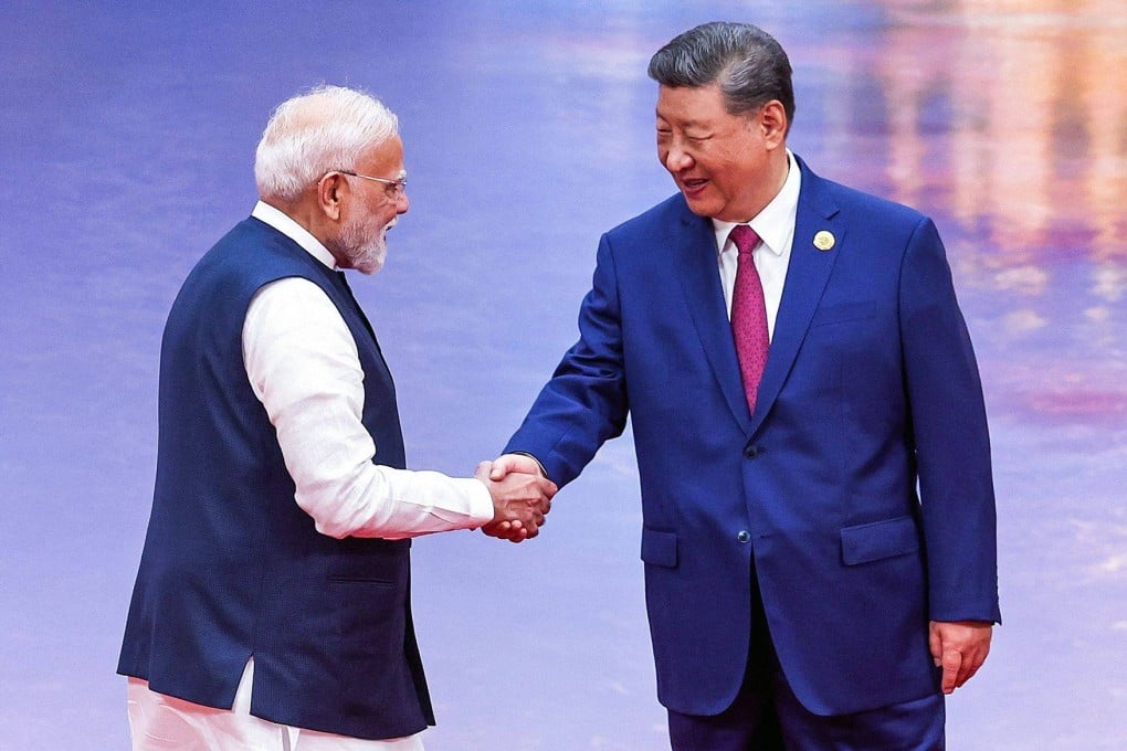 Indian Prime Minister Narendra Modi, (left) and Chinese President Xi Jinping shake hands during the welcoming ceremony of the Shanghai Cooperation Organisation summit in Tianjin on August 31, 2025. Photo: AFP