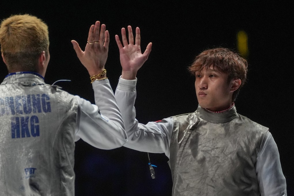 Hong Kong’s Ryan Choi (right), high-fiving team-mate Cheung Ka-long during the World Championships men’s foil team final against Italy in July, has been “reflecting on my fencing”. Photo: Elson Li