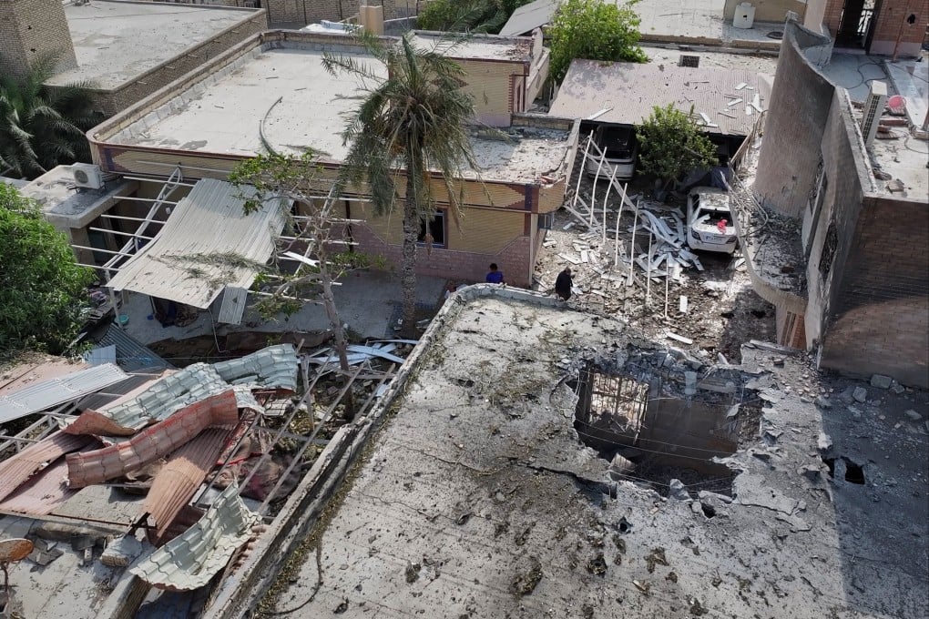 The point of impact on a residence in Kuhestak, southern Iran, where the wedding celebration was taking place. Photo: Tasnim News Agency via AP