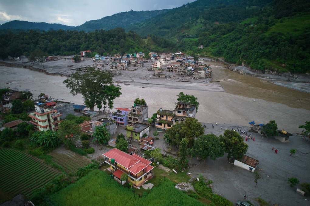 Cross-border disasters, such as the Nepal-China landslide and flooding last week, will test China’s diplomatic relationships with its neighbours, experts say. Photo: AP