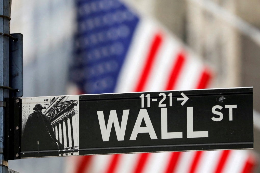 A street sign for Wall Street is seen outside the New York Stock Exchange. Photo: Reuters