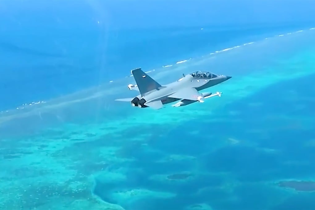 A Chinese JL-10 trainer jet flies over Scarborough Shoal on Wednesday. Photo: CCTV